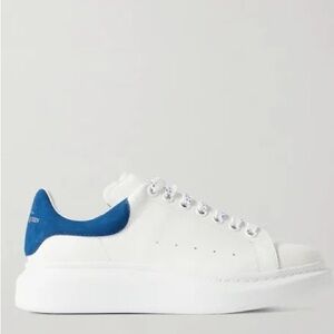 These are the blue and white Alexander McQueens in the size 4.5 good condition.